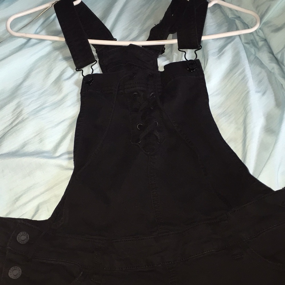 Black distressed overalls